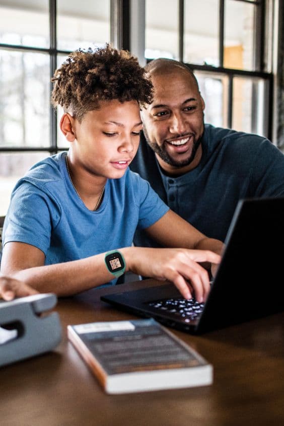 Parent helping child